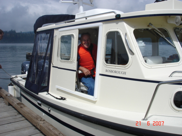 21 August Cornet Bay
Joe in the helm seat