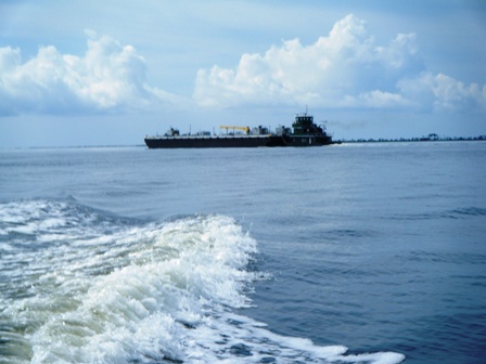 22MAY10-Pusher Barge on ICW at  Bay River