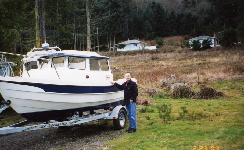 23 Feb 2003:  Visiting our C-Dory at EQ Marine before Les installs the motor & other items.