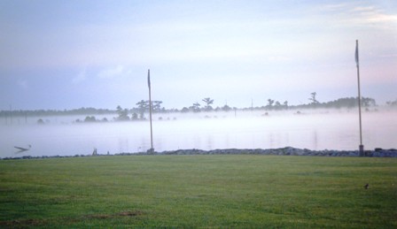 23MAY10-Sunrise over marsh at Alligator River Marina