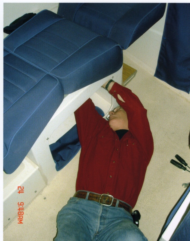 24 May 2005:  Removing the twelve screws and lock nuts.