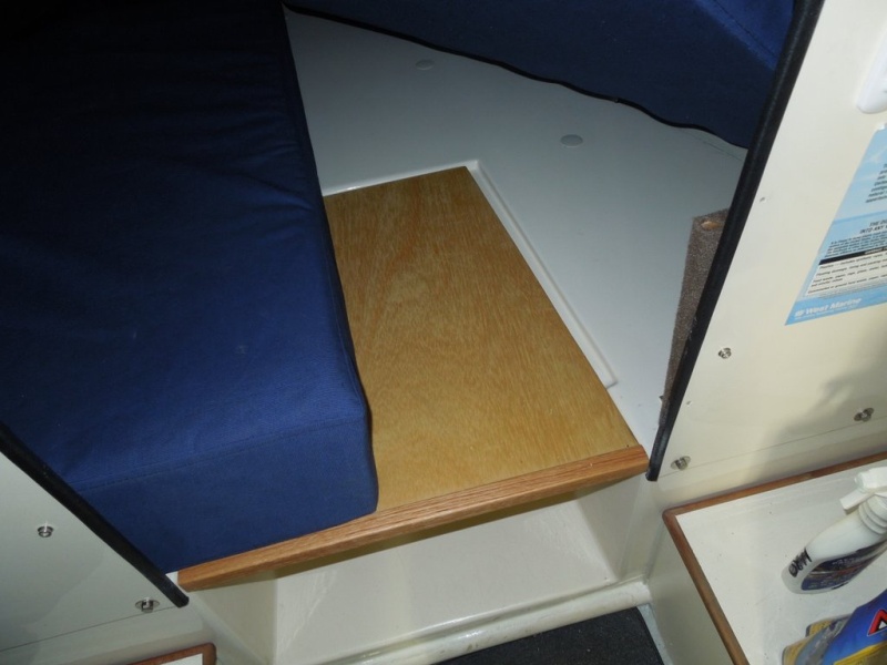 3/4in veneered plywood faced with trim to cover the void.