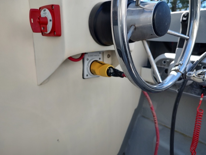 30amp shore power inlet installed. Mounted under rear steering console.