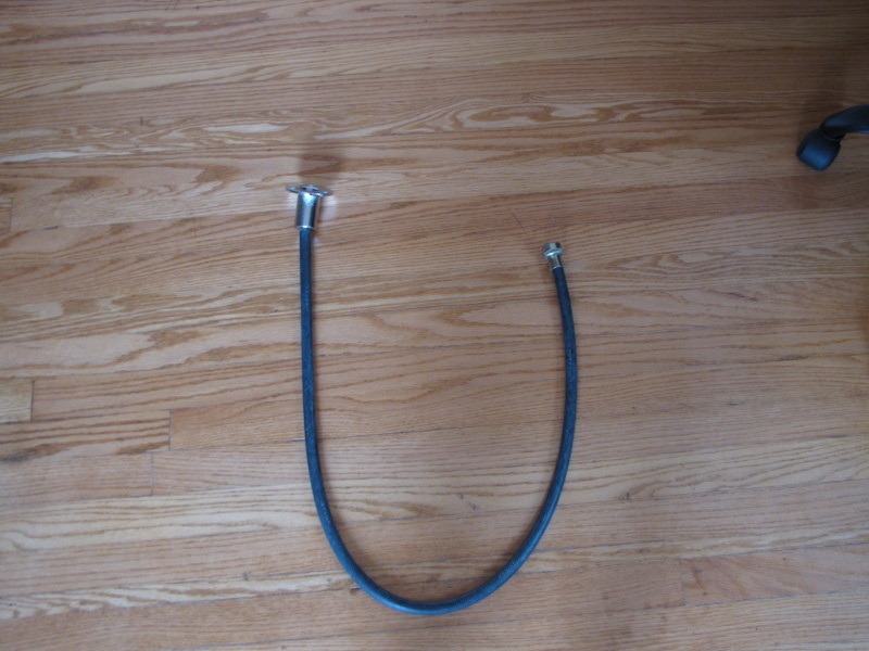4/27/11 Perko Flag Pole Socket/ Attached rubber hose in order to direct rain water to bilge.