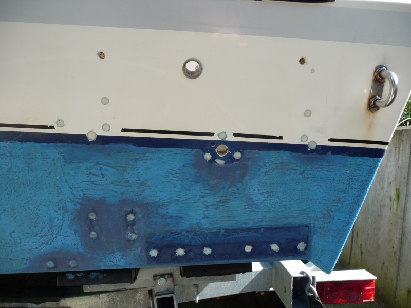 4. Added "Mini Fibers" to System Three Cold Cure epoxy to thicken mix for holding on a verticle surface. Filled holes with two coats of epoxy.