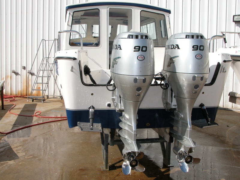 4 blade 15" pitch SS Honda props.
