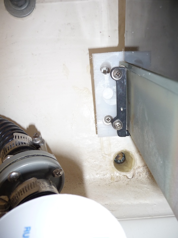 4. View drain plug from the inside with epoxy applied and drain plug in place.