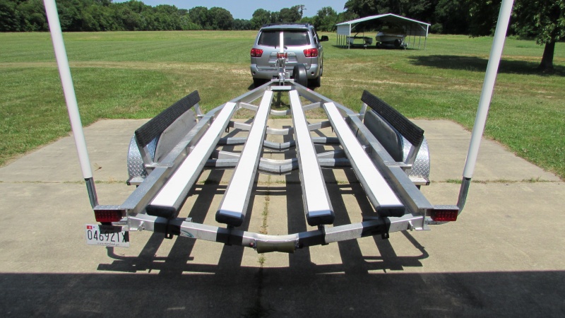 5 x 48 bunk glides from surfix on Amazon.  This mod enabled me to load and unload in shallow water.