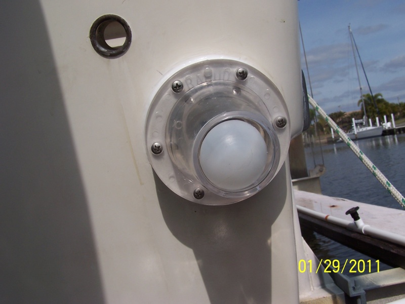 6 stainless steel screws, wipe the caulking off and you are done.