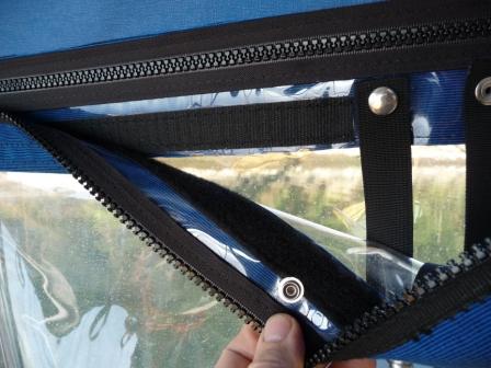 9. Velcro shown on the top of the window aft, to secure the cockpit canvas access door.