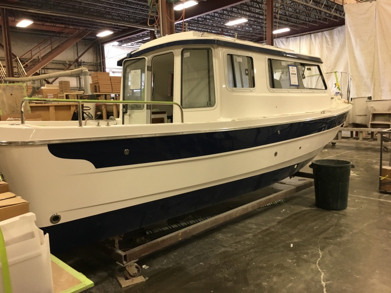 A 25 Cruiser in the final rigging area.
