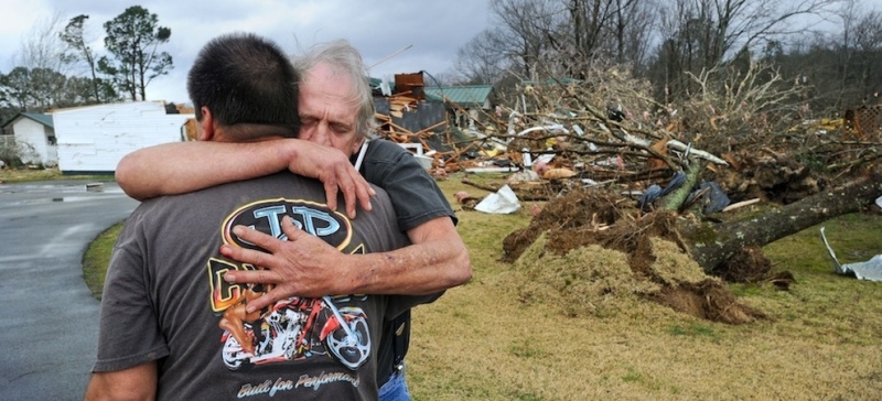 A Man Reunites With His Dog After The Alabama Tornado 1