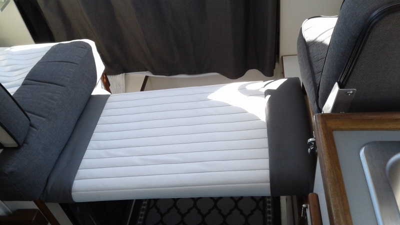 A simple extra Seat pad can be used as extra seat for kids or dog or just a place to stretch your legs out, turn it over to a non padded size give more working space for the galley.