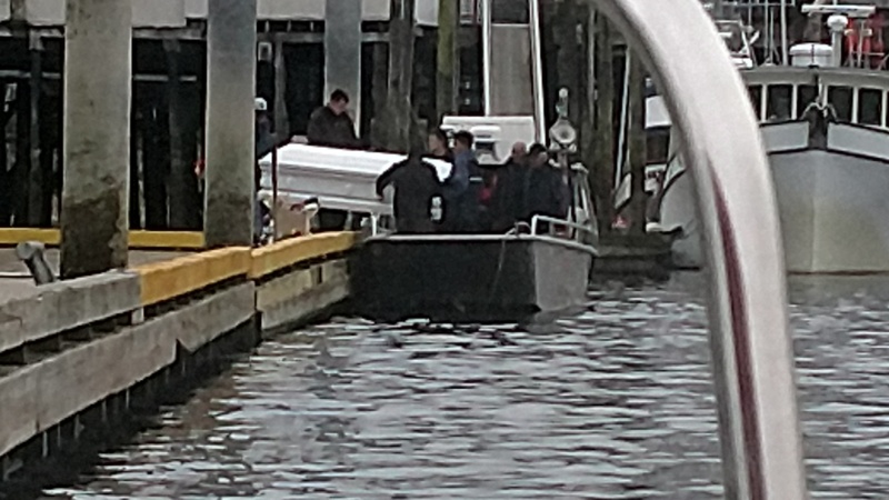 a skiff filling as a Hearse