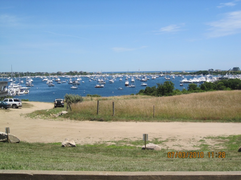 A view of some of the boats at Block Island New Harbor salt pond.This place has every kind of boat and dinghy imaginable. Pump out boat makes the rounds along with boats peddled breakfast pastries and then later premade dinner items. What a experence