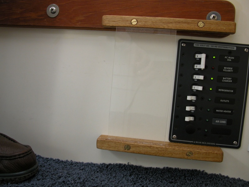 AC Power Panel cover_'a' view. Top guide base had to be hand notched for table top support mounting bolt. Top was placed abt 1/16" above bottom edge to allow enough support when mounting screw hole was pre-drilled.