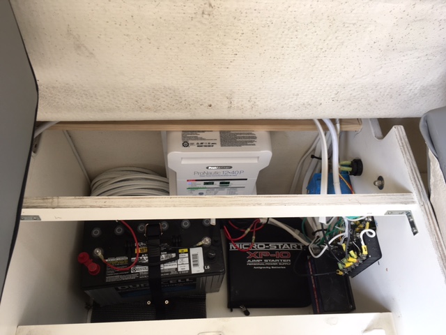 Added AGM batt, and charger in same compartment as factory Guest. Made wiring very easy