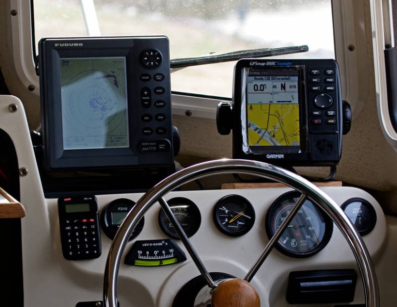 Added Furuno 1715 Radar and Navman F210 Flowmeter (Far Left guage). Fabricated new mount for Garmin GPS/chartplotter. Both units can be swiveled and rotated up and down. Radar and GPS connected via NMEA 0183 interface allowing transfer of NAV DATA and Waypoint Lollipop to Radar.