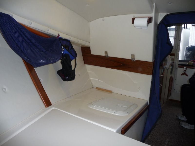 Aft to Starboard.
Access cover to back of Helm.