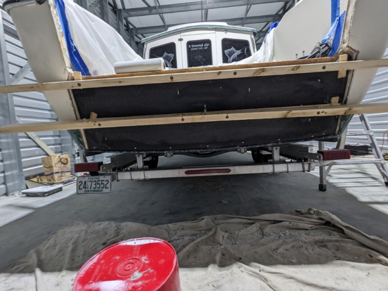 all excess epoxy paste that squeezed out along the perimeter was thoroughly removed and cleaned off to be added just before the transom outer glass face was reapplied.