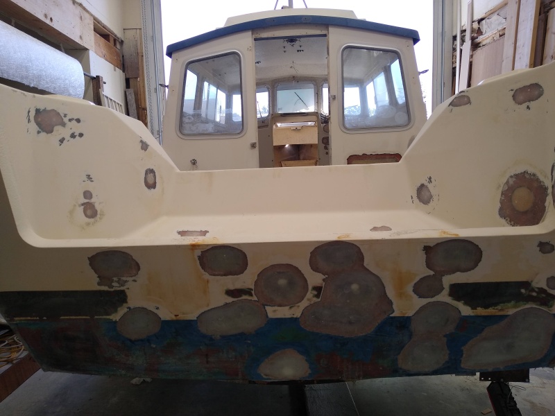 All fasteners removed and all holes epoxy filled.