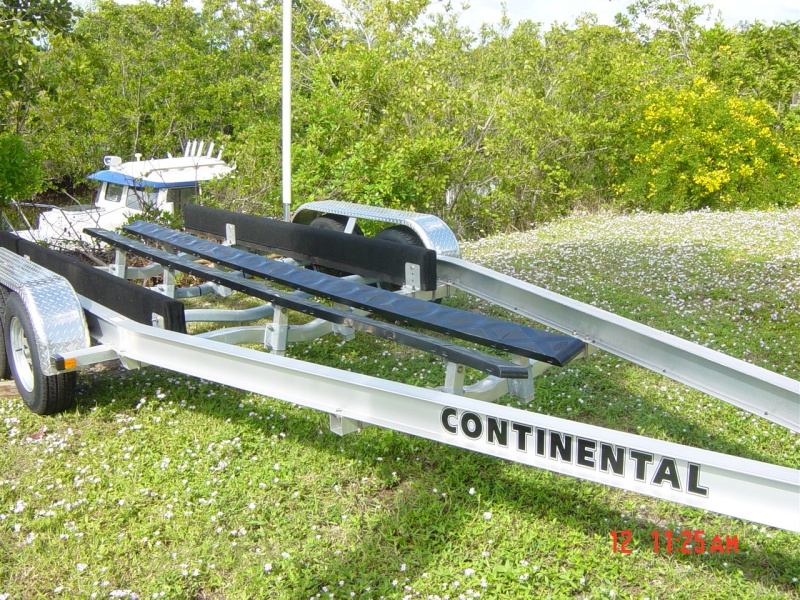 Alum . trl.  with 2by6  plastic tops and 3by 8 beams covered in rug Great trailer the cc-23 loads so nice