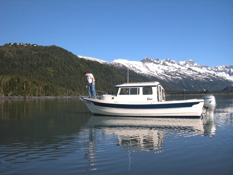 (AnchortownJim) Bill on the bow of Coho, Pigot Bay, PWS, 6/19/04