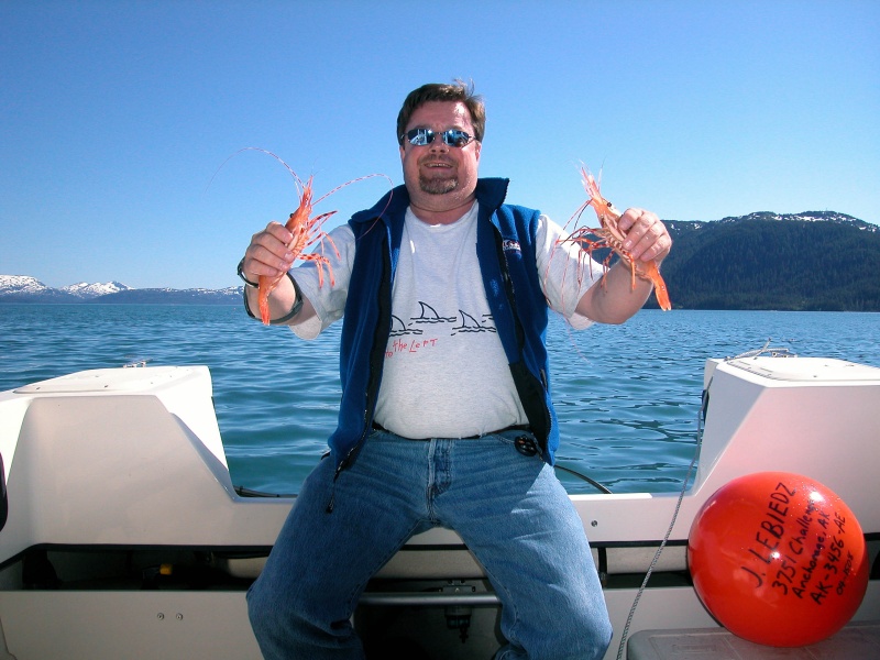 (AnchortownJim) Bill with two nice spotted prawns, Pigot Bay, PWS, 6/19/04