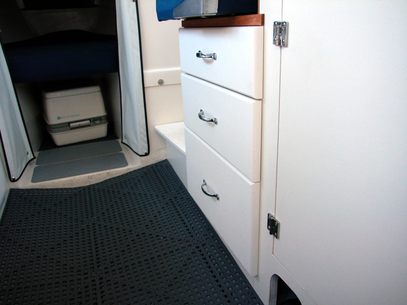 (AnchortownJim) The drawers I built to fill the void from the removed ice box.  The fronts are made out of 3/4" Starboard.
