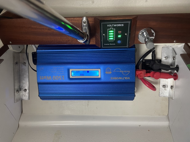 angle aluminum screwed into cabinets and bolted to plywood panel
House Battery 2 connects directly to inverter via buss so short run reduces resistance as the big battery?s main job is 110v AC and backup for House Battery 1 if needed.