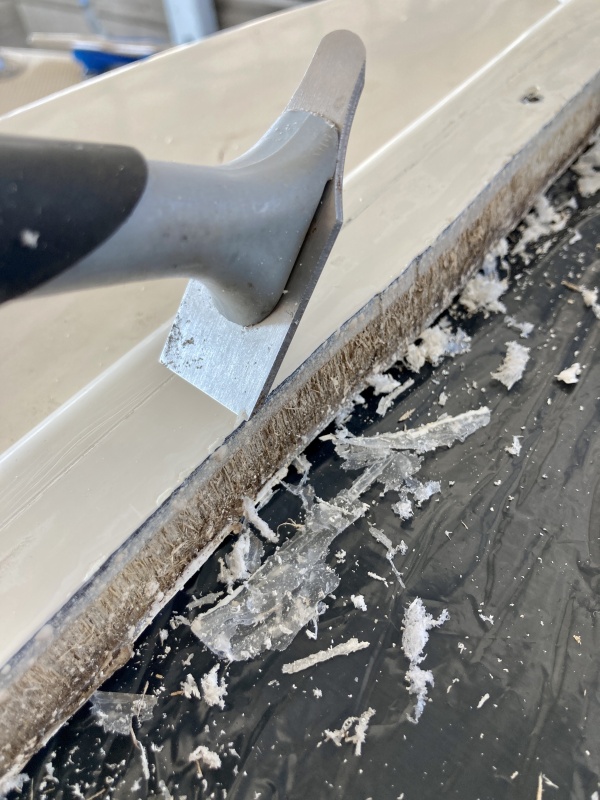 Another boater lent me this great little pull scraper to clean up the parameter.