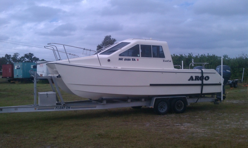 ARGO sitting on the new to me Float On trailer.  I still have a couple smaller things to do to it but it is basically done and trails down the road very well.  Took it the scales twice to get it balanced right and the right weight on the tongue which required me to move both axles back 9".