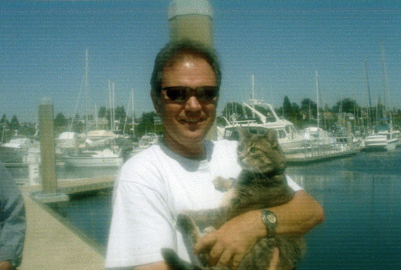Aug 2006 - Bellingham 
   Jim & Molly aka 
the C-Brat Boat Cat 
     WILD BLUE