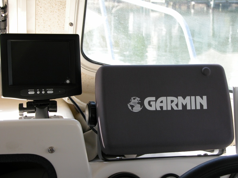 Backup system LCD color monitor beside GARMIN 2006C. Audio from camera mic is fed to monitor.