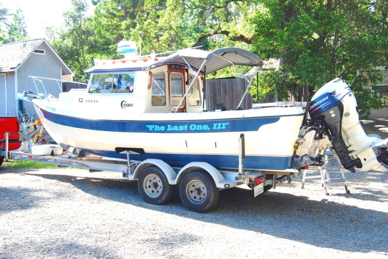 Been some changes since she came home (photo 3) June 2010
Black tape on sides mark the approx. locations of the 20" legal sturgeon slot for CA from back of boat.