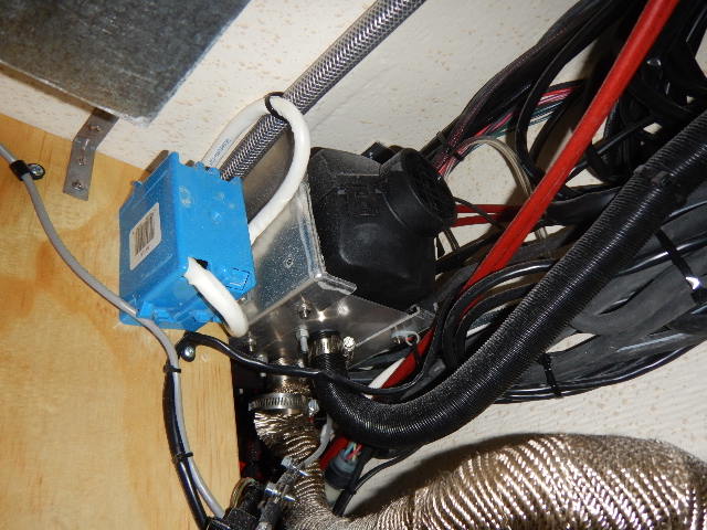 Behind fridge Top left of pic shows bottom of new Origo alcohol stove. Goodby Wallas!