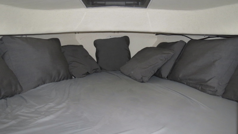 Berth with memory pad and sheets for sleeping.  Additional photos follow.