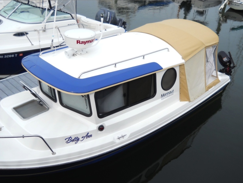 Betty Ann at Brewer Wickford Cove Marina in Naragansett Bay, Rhode Island..  The temperature was near 90, so we installed our window covers to keep out the sun.
