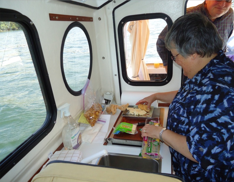 Betty preparing snacks for our two guests