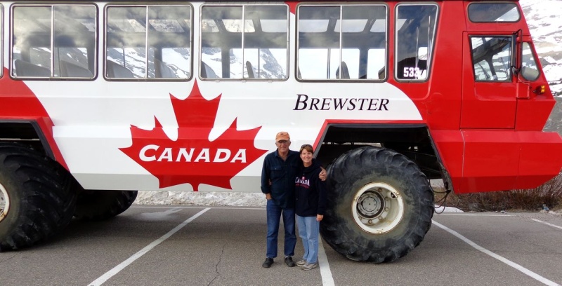 BIG bus takes tourists on the Athabasca Glacier.  Icefields Center. B.C.