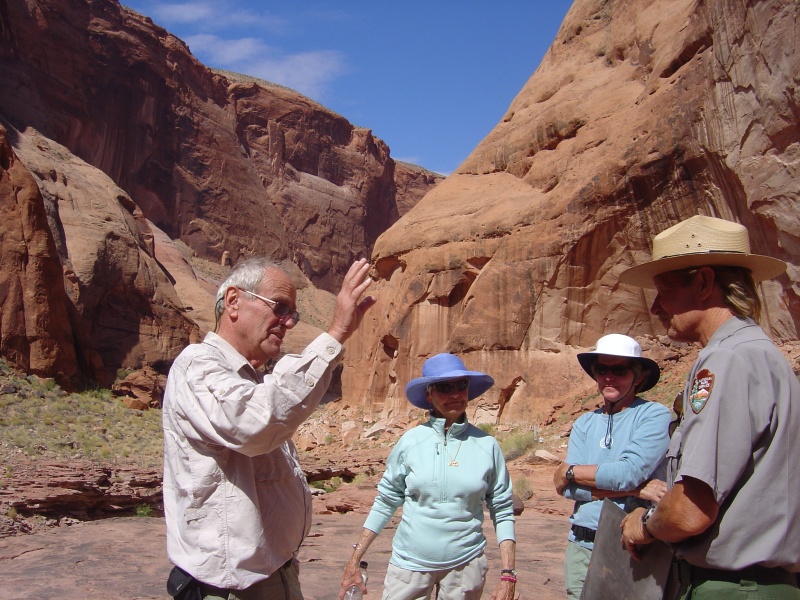 Bill explaining Rainbow Bridge geology to ranger, El, and Robbi