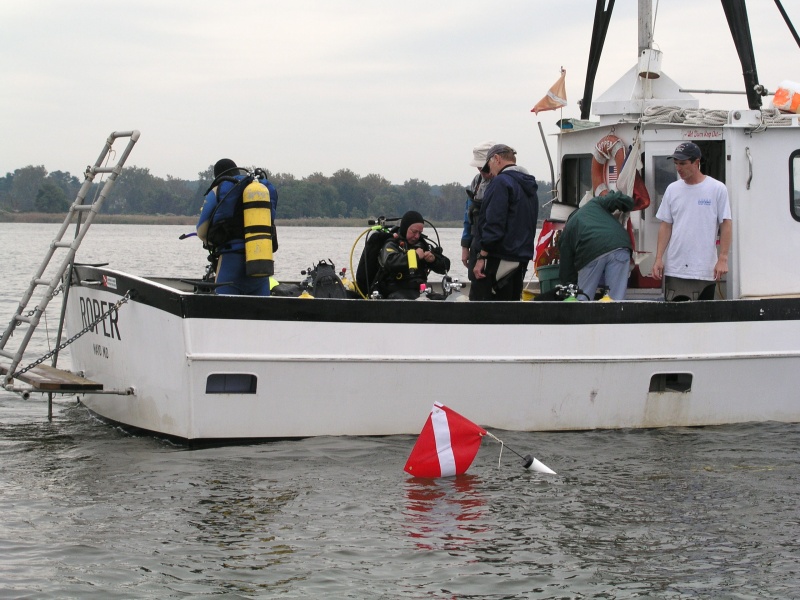 (Bluecrab) Buoying a sonar target for diver investigation.