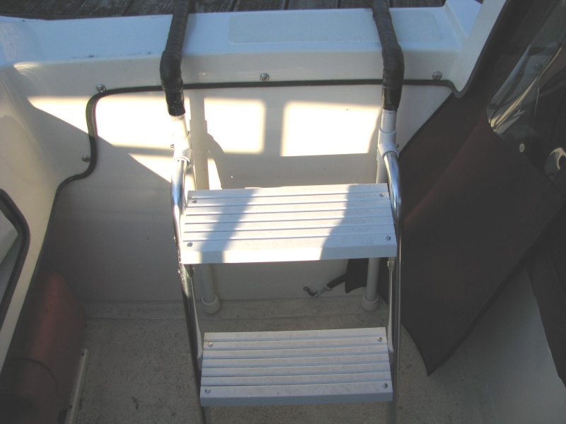 Boarding Ladder inside view.  Garelick ladder was fitted to homemade PVC assembly. Note that we added another pair of legs for increased stability.