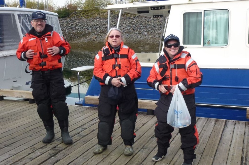 Boat crewmembers chatting dock side