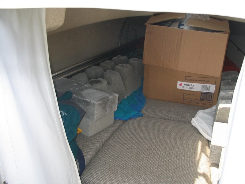 Boat loaded with ballast for mooring buoy, 350 lbs concrete aft
