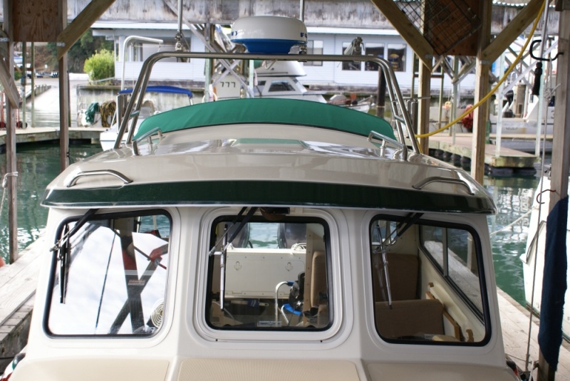 Boat mods 005 - Handrails mounted on "eyebrow"