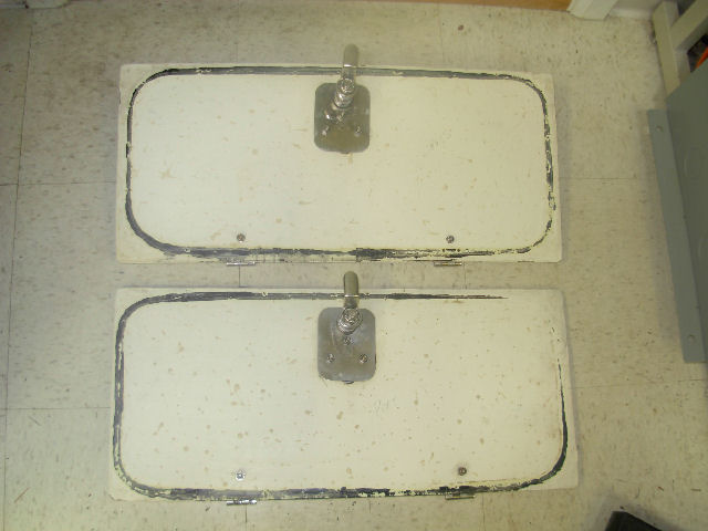 Bottom of cockpit hatches marked with paint revealing lack of seal