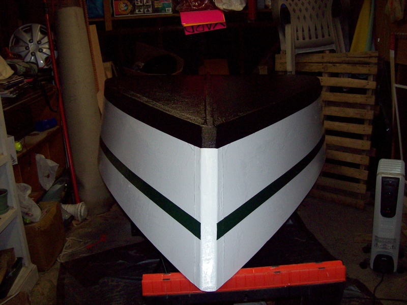 Bottom paint and exterior sides complete.  Low light does not show hunter green stripe in this picture to match Napoleon.