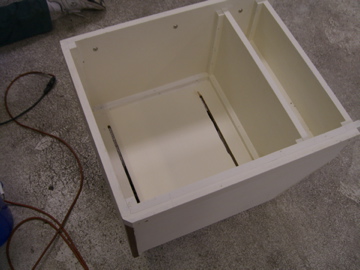 Box seat rebuilt with tracks cut in bottom.