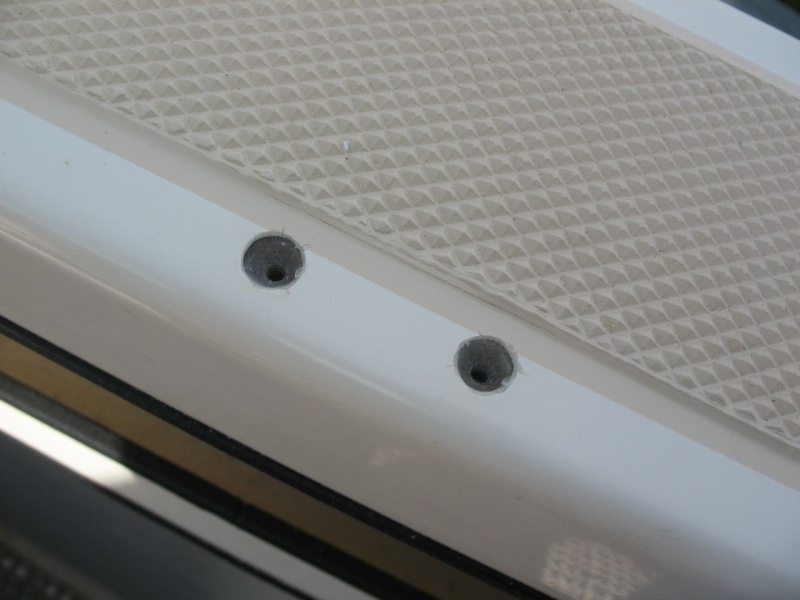 bracket holes re-drilled and chamfered